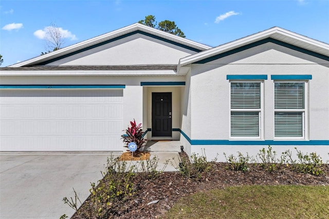 single story home featuring a garage