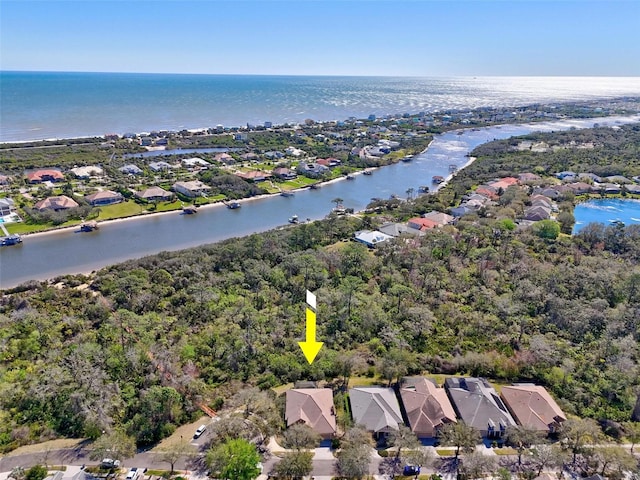 bird's eye view with a water view and a residential view