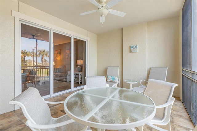 interior space featuring ceiling fan