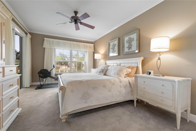 bedroom featuring crown molding, light colored carpet, and ceiling fan