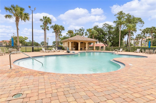 view of pool featuring a patio area