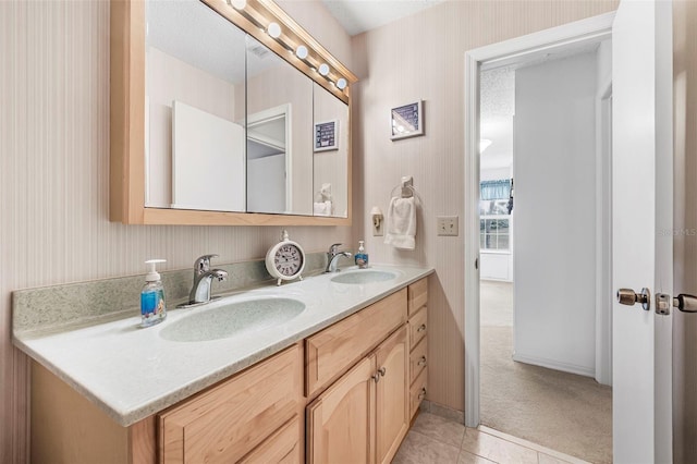 bathroom featuring vanity and tile patterned flooring