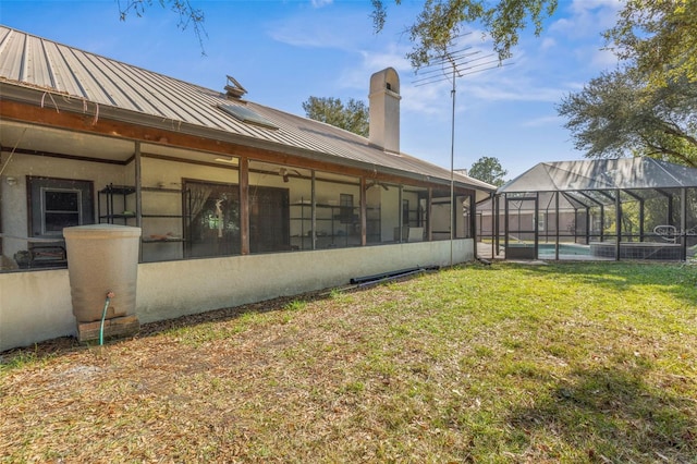 view of yard with a lanai