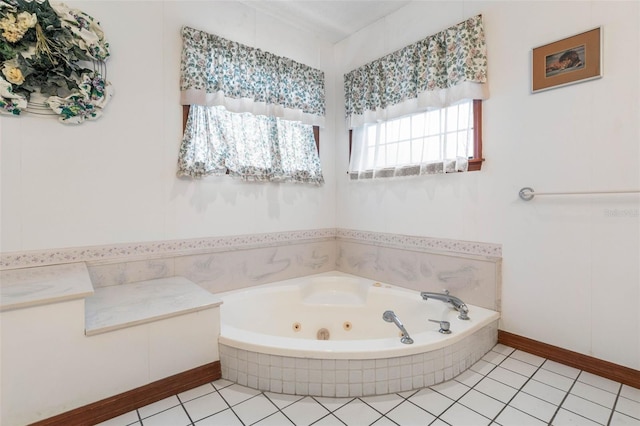 bathroom featuring tile patterned floors and tiled tub