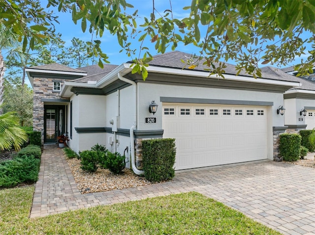 view of side of home featuring a garage