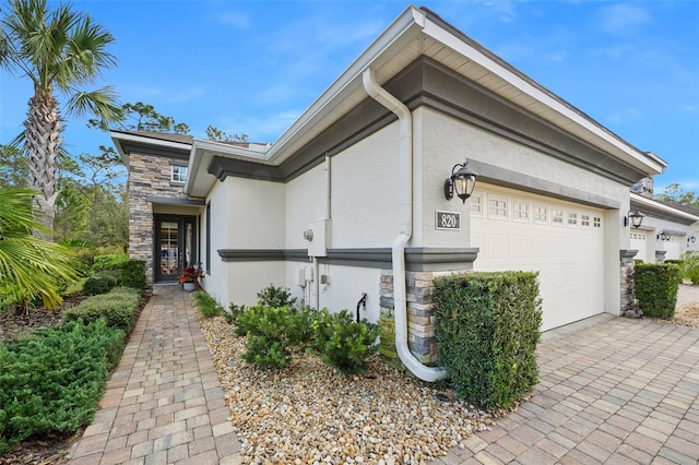 view of property exterior with a garage