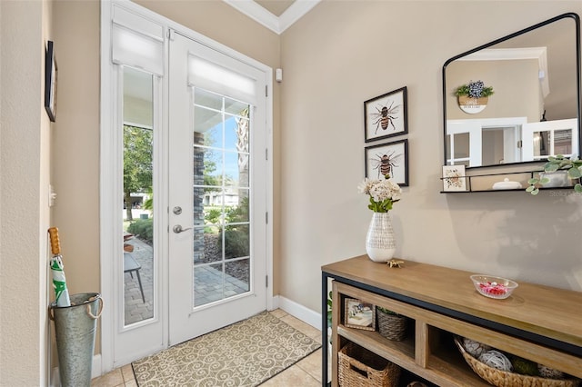 doorway to outside with crown molding and light tile patterned flooring