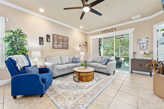 living room featuring crown molding, light tile patterned floors, and ceiling fan