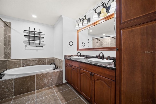 bathroom with tile patterned floors, ornamental molding, plus walk in shower, and vanity