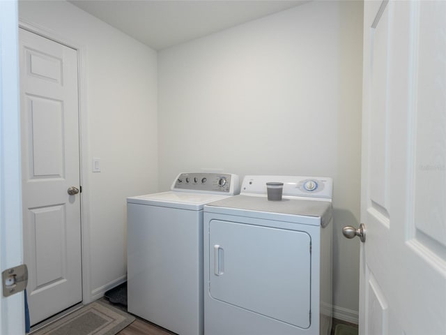 laundry area featuring independent washer and dryer