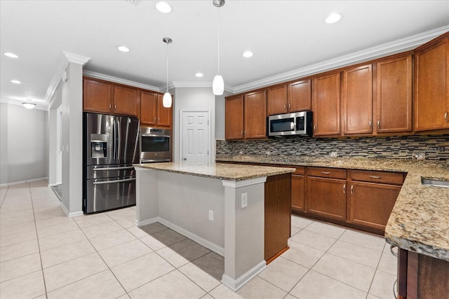 kitchen featuring decorative light fixtures, light tile patterned floors, appliances with stainless steel finishes, a kitchen island, and decorative backsplash