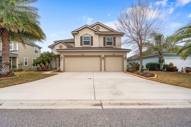 view of front property featuring a garage and a front lawn