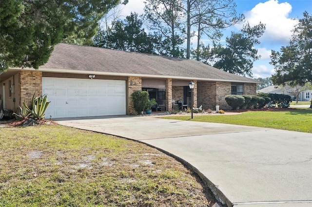 ranch-style house with a garage and a front lawn