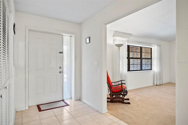 view of carpeted entryway