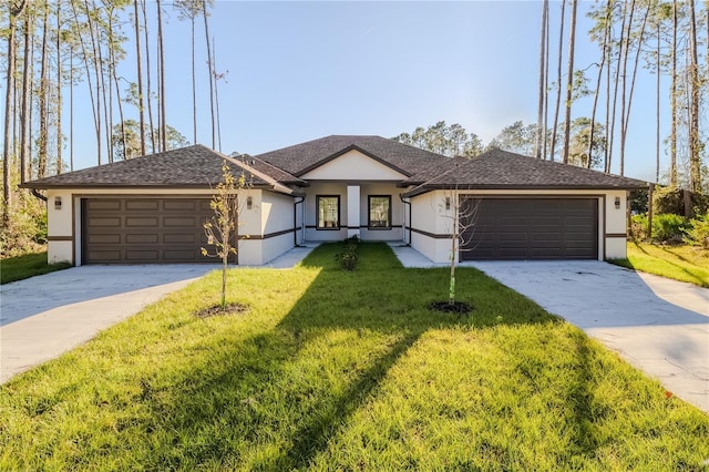 ranch-style home featuring a garage and a front yard