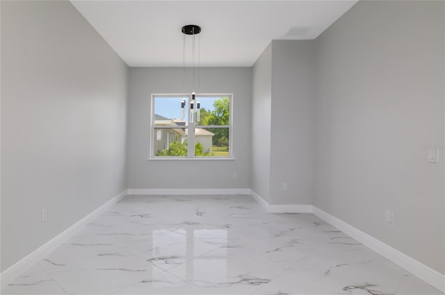 20 Pine Hill Ln, Palm Coast, FL 32164 - unfurnished dining area with baseboards and marble finish floor