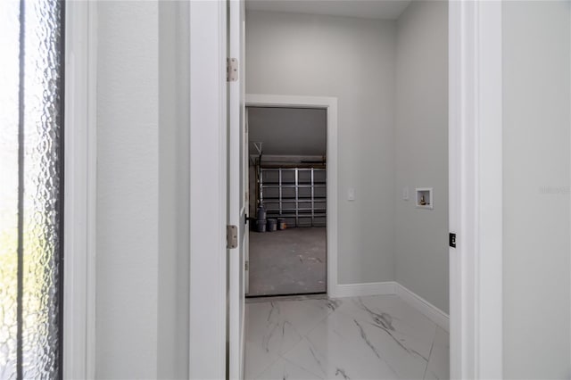 20 Pine Hill Ln, Palm Coast, FL 32164 - hallway featuring baseboards and marble finish floor