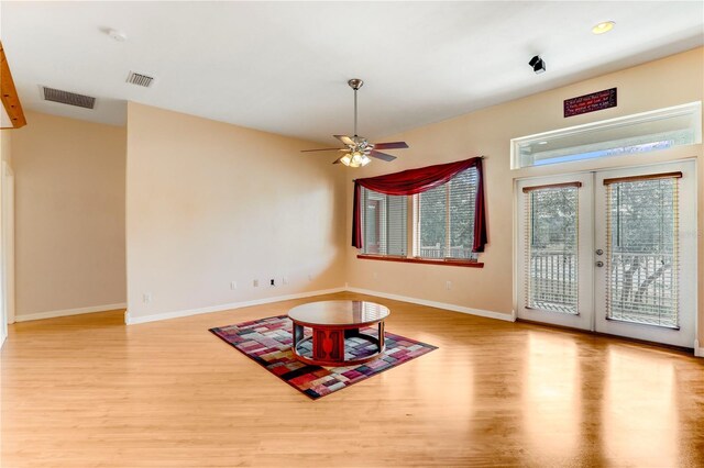 interior space featuring french doors, ceiling fan, and light hardwood / wood-style floors