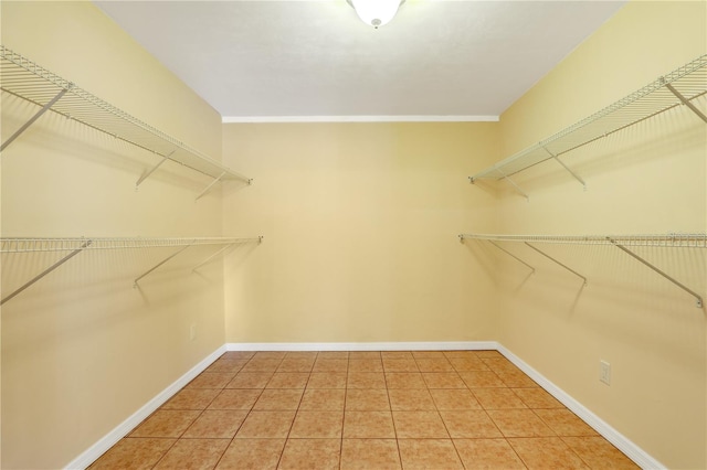 spacious closet featuring tile patterned floors