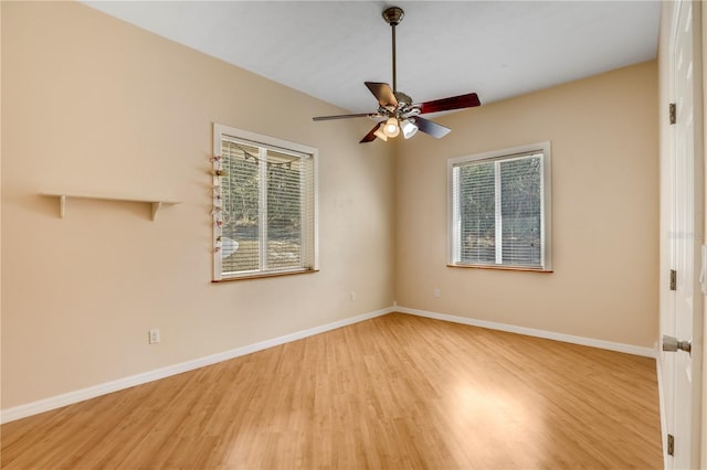 unfurnished room featuring ceiling fan, a healthy amount of sunlight, and light hardwood / wood-style floors