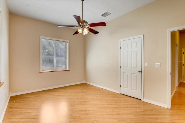 unfurnished room featuring ceiling fan and light wood-type flooring