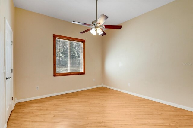 spare room featuring ceiling fan and light hardwood / wood-style floors