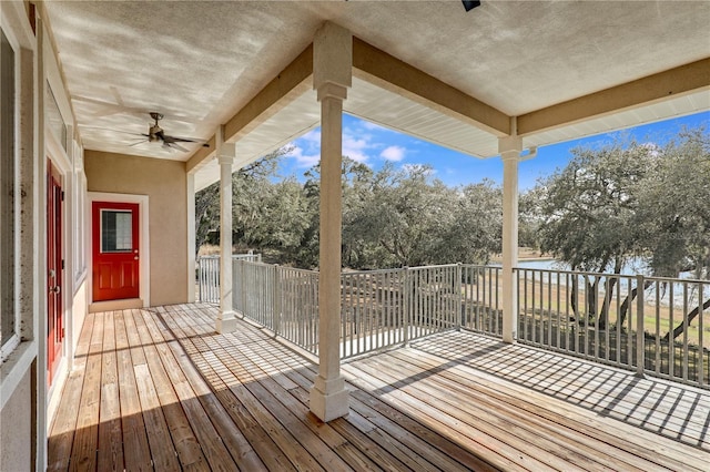 wooden terrace with ceiling fan