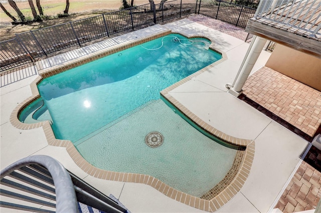 view of pool with a patio