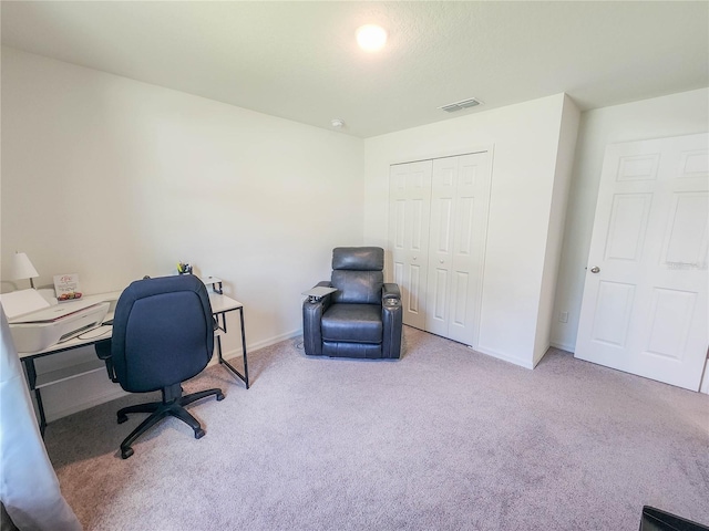 office area with light colored carpet