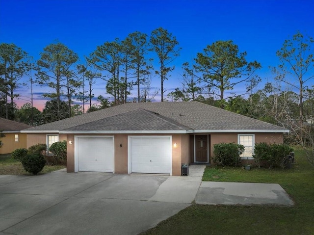 ranch-style house featuring a garage, concrete driveway, roof with shingles, and stucco siding