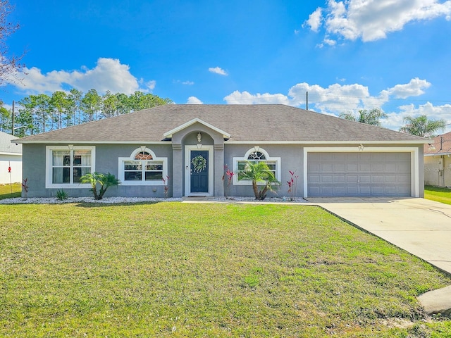 single story home with a garage and a front lawn