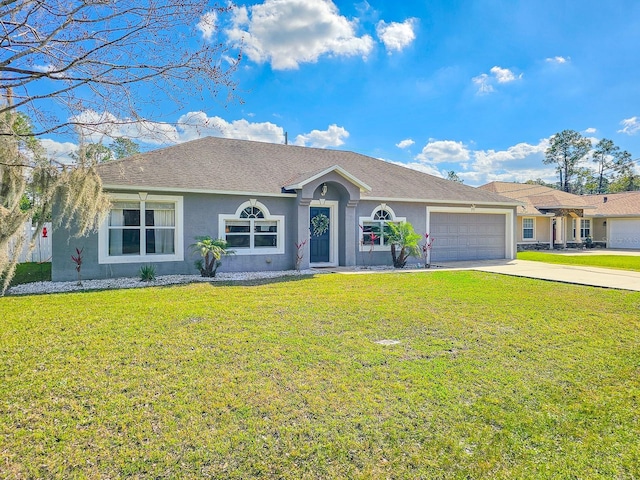 ranch-style house with a garage and a front lawn