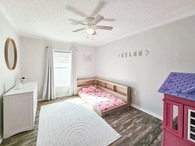 bedroom with crown molding, ceiling fan, a textured ceiling, and dark hardwood / wood-style flooring