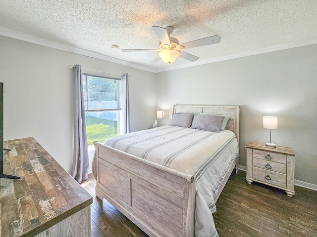 bedroom featuring crown molding, a textured ceiling, and dark hardwood / wood-style flooring