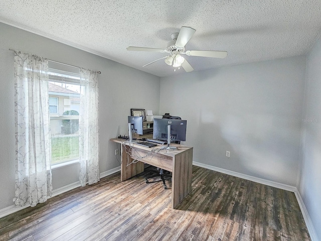 office space with ceiling fan, dark hardwood / wood-style floors, and a textured ceiling