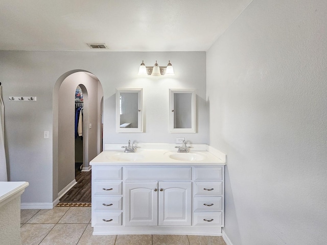 bathroom featuring vanity and tile patterned floors