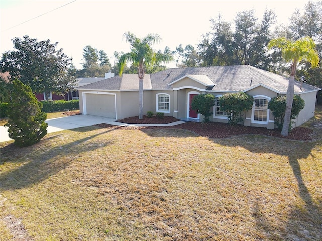 ranch-style home featuring a garage and a front yard