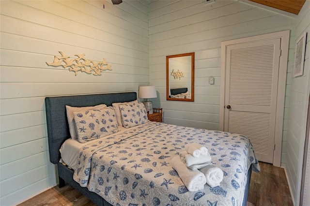 bedroom featuring wood finished floors