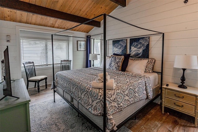 bedroom featuring wood ceiling, vaulted ceiling with beams, wood walls, and wood finished floors