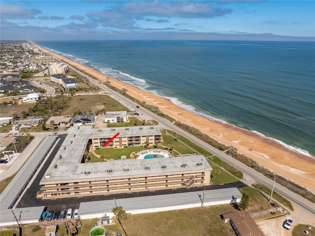 aerial view with a view of the beach and a water view