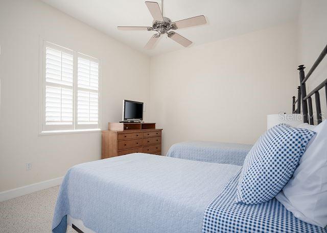 bedroom featuring ceiling fan