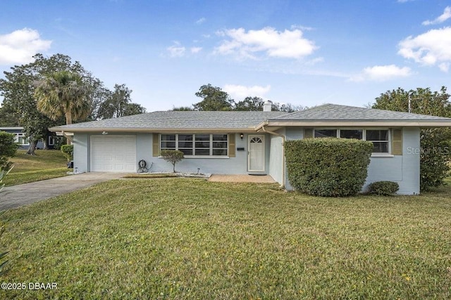 ranch-style house with a garage and a front lawn