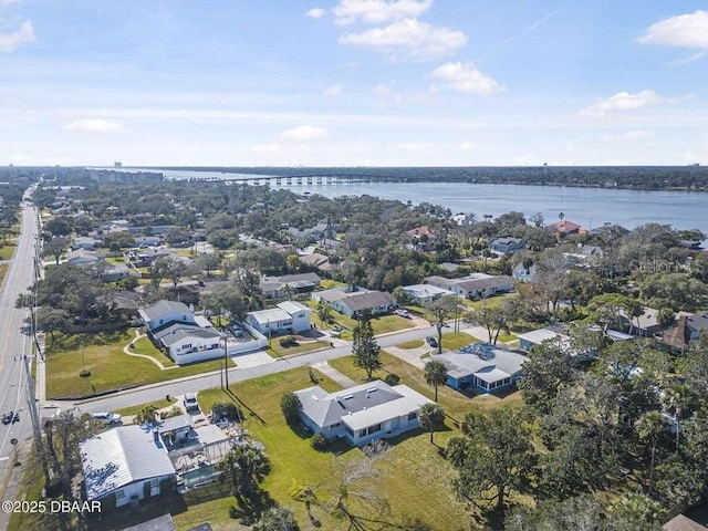 bird's eye view with a water view