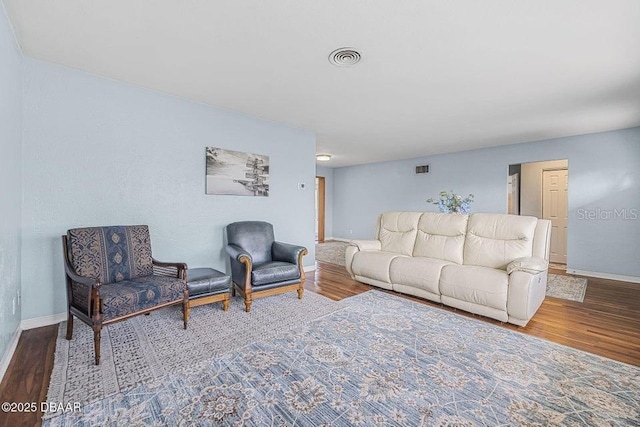 living room with wood-type flooring