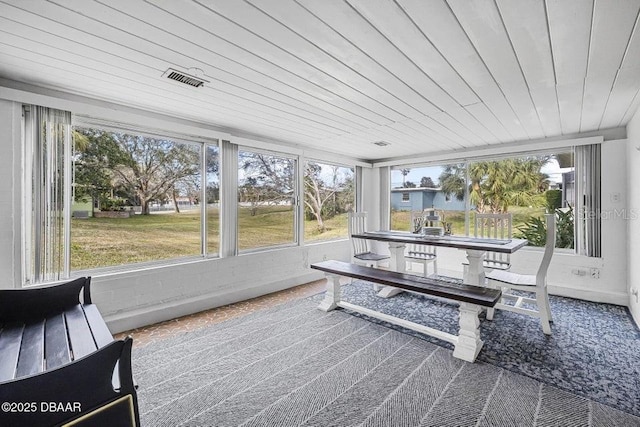 sunroom / solarium with wood ceiling