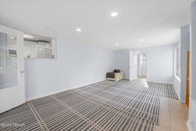 interior space featuring light tile patterned floors