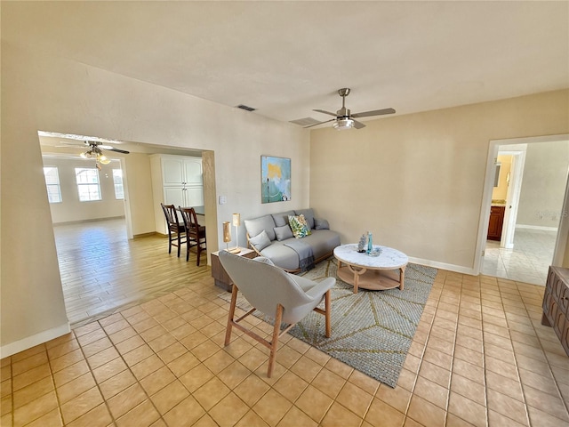 155 Avalon Ave, Flagler Beach, FL 32136 - living room featuring ceiling fan and light tile patterned floors