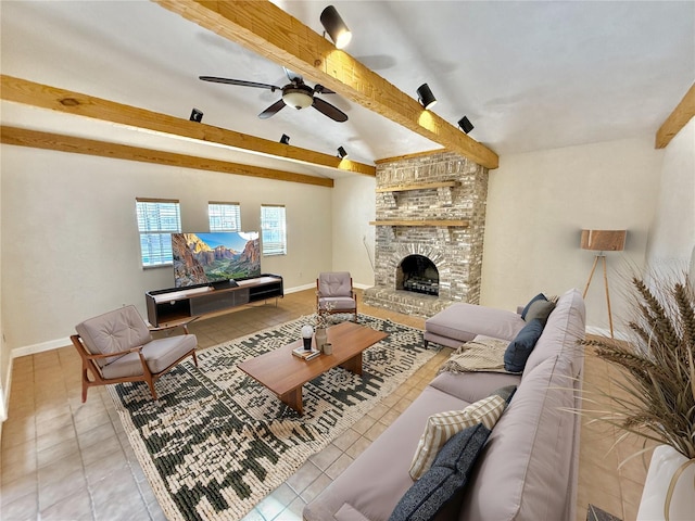 155 Avalon Ave, Flagler Beach, FL 32136 - living room with ceiling fan, tile patterned floors, a fireplace, and beam ceiling