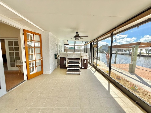 155 Avalon Ave, Flagler Beach, FL 32136 - sunroom featuring ceiling fan and a water view