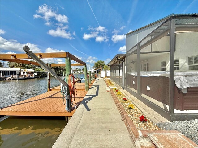 155 Avalon Ave, Flagler Beach, FL 32136 - view of dock with a lanai and a water view